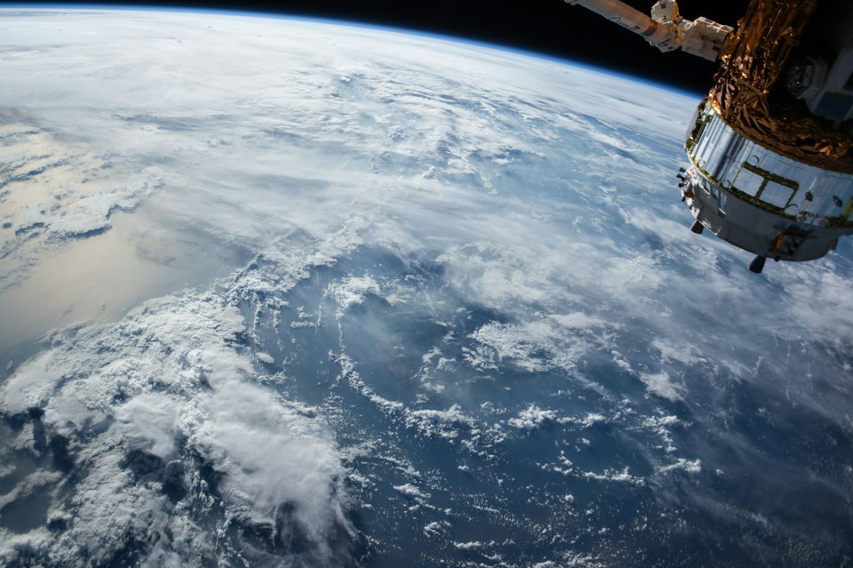 Earth seen from orbit against a dark sky