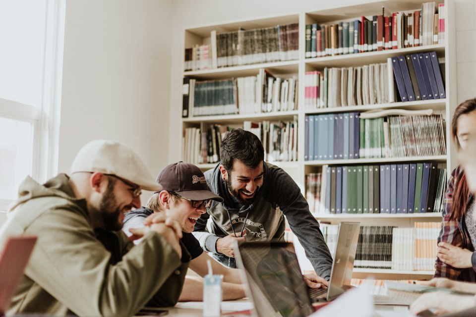 Students studying together around a table